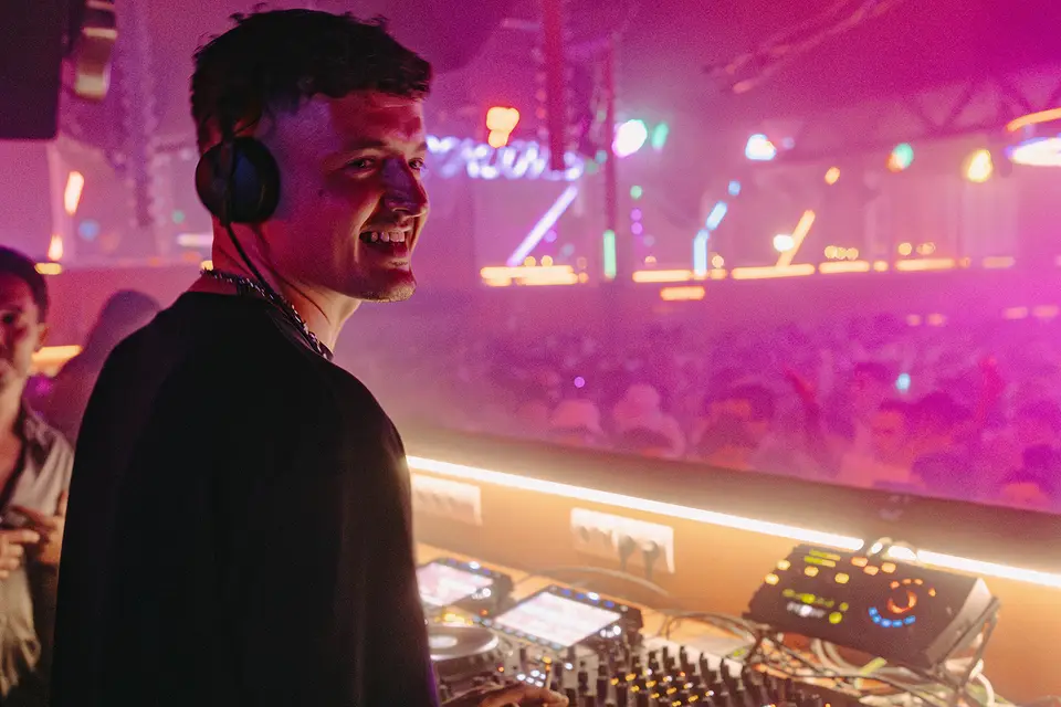 A DJ at the decks inside DC10